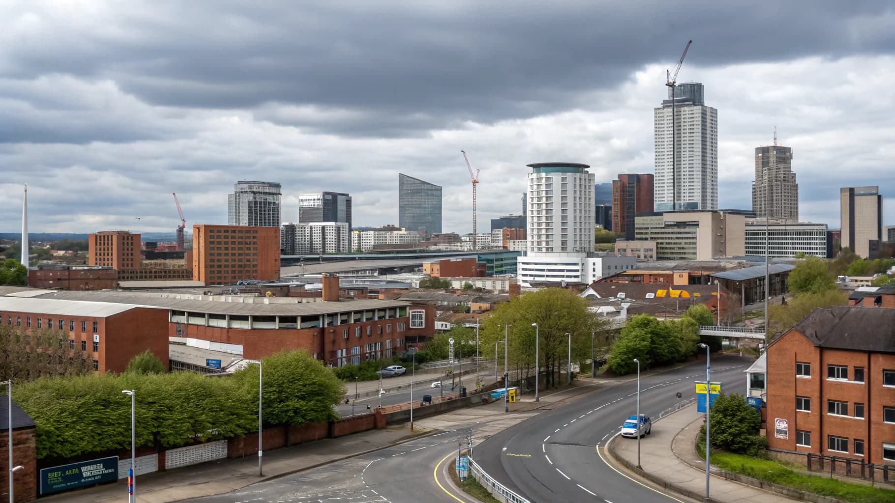 The Electrical Folks Birmingham electrical workshop facility with service vehicles and equipment storage area, no humans appears in the image